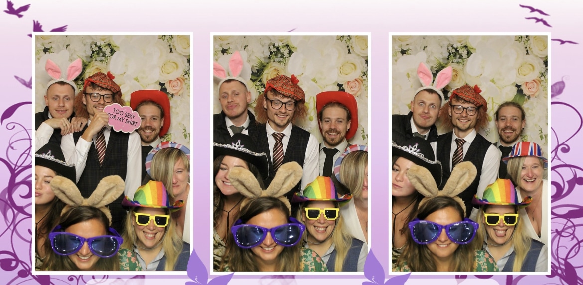 Friends Having Fun at the Wedding Photo Booth
