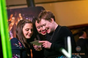 Lovely ladies enjoying looking at copies of photos they had taken on the Mirror Air