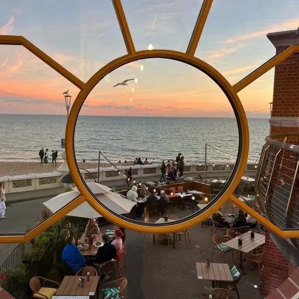 Seaside restaurant view in Brighton during sunset