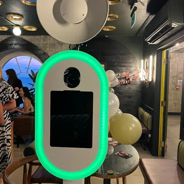 Selfie pod setup with balloons and ambient lighting at a Croydon event venue