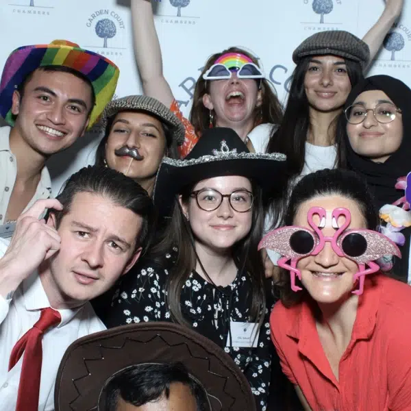 Corporate event photo booth setup with branded backdrop