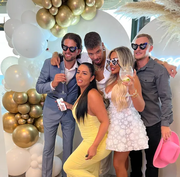 Brighton wedding guests enjoying booth fun without backdrop